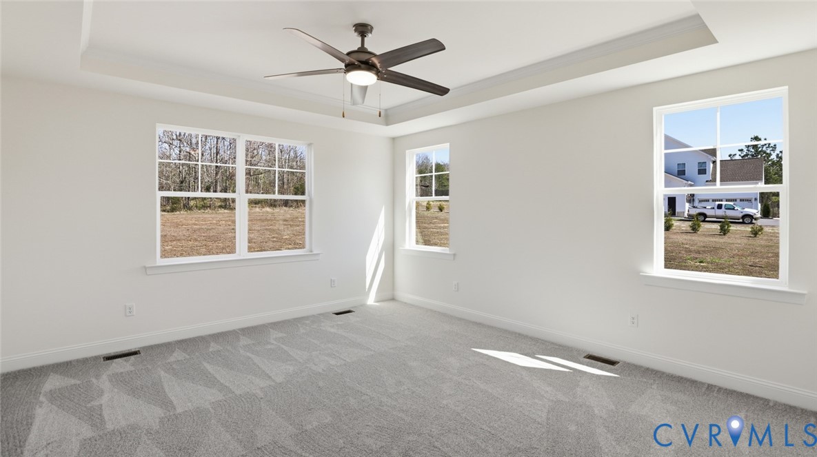 3726 Rocketts Ridge Drive Goochland, VA 23063 - Photo 19 of 38 The first-floor primary suite offers a luxurious r