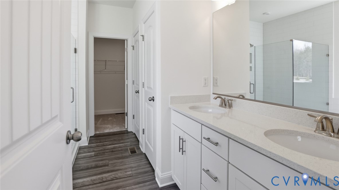 3726 Rocketts Ridge Drive Goochland, VA 23063 - Photo 20 of 38 The first-floor primary suite offers a luxurious r