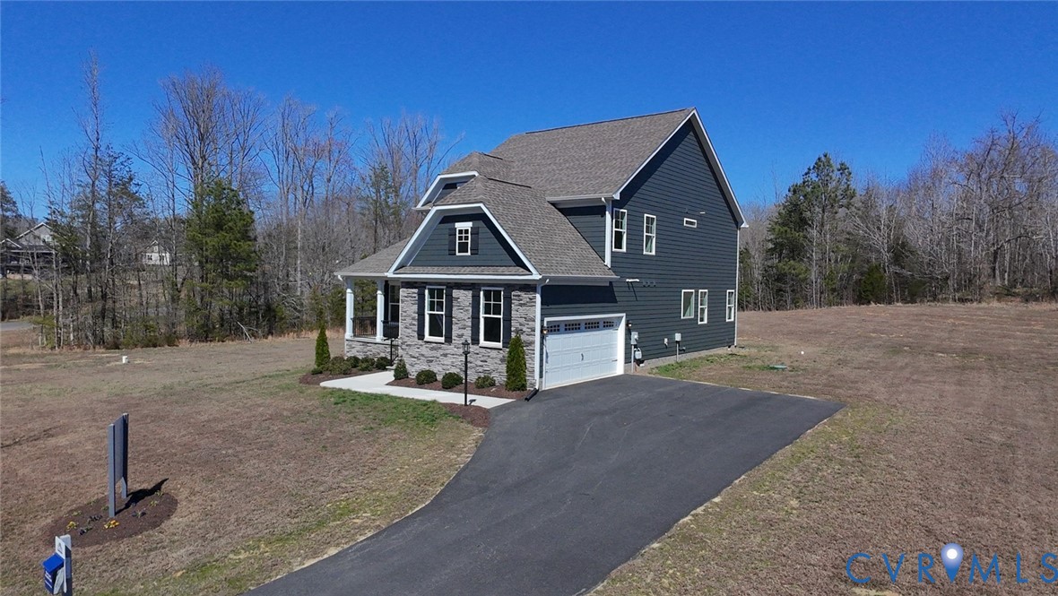 3726 Rocketts Ridge Drive Goochland, VA 23063 - Photo 35 of 38 Nestled amidst rolling hills and lush greenery, th