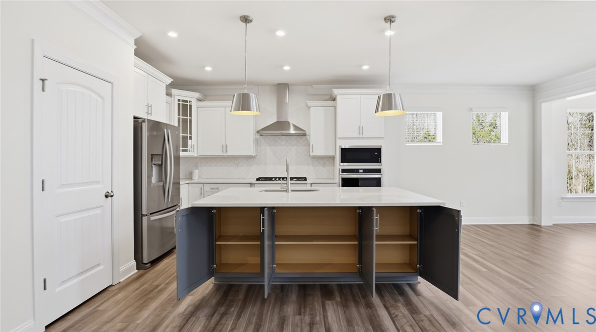 3726 Rocketts Ridge Drive Goochland, VA 23063 - Photo 10 of 38 he welcoming foyer opens to a formal dining room,