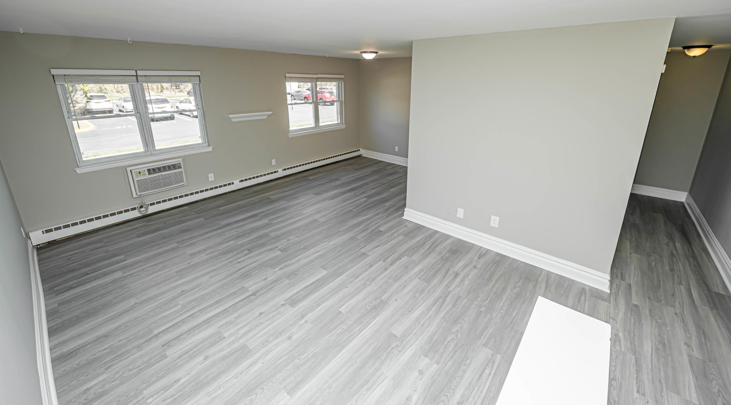 59 Stonehurst Boulevard, Unit B Freehold, NJ 07728 - Photo 11 of 25 an empty room with windows