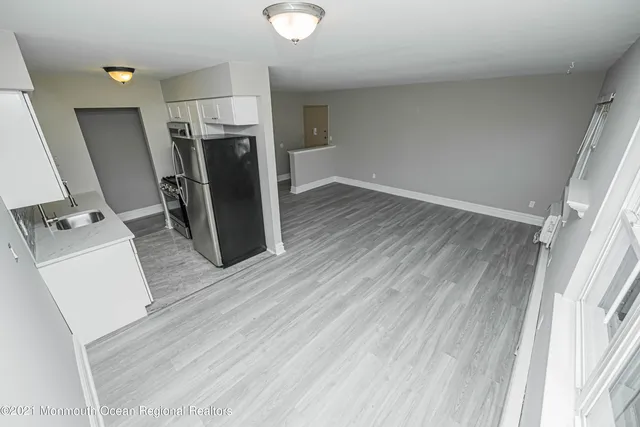 a view of a storage & utility room with a sink