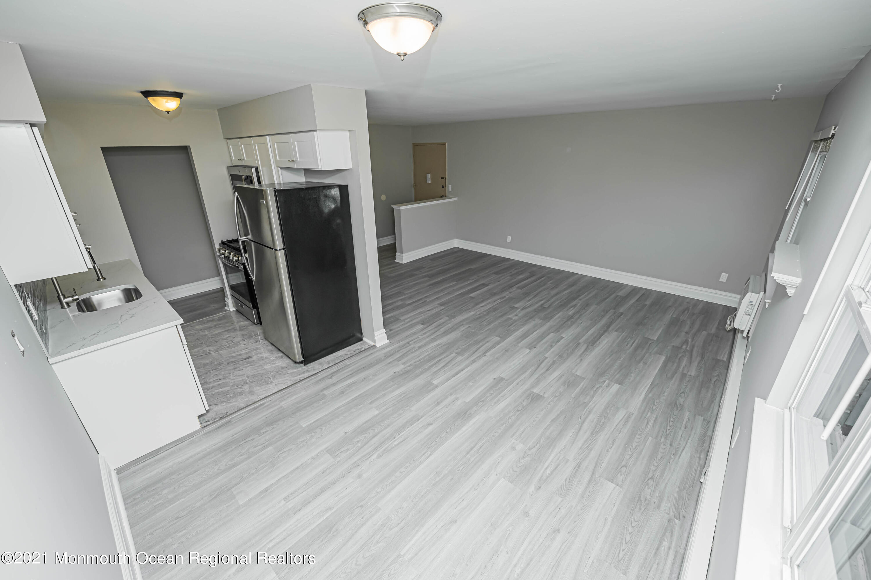 59 Stonehurst Boulevard, Unit B Freehold, NJ 07728 - Photo 7 of 25 a view of a storage & utility room with a sink