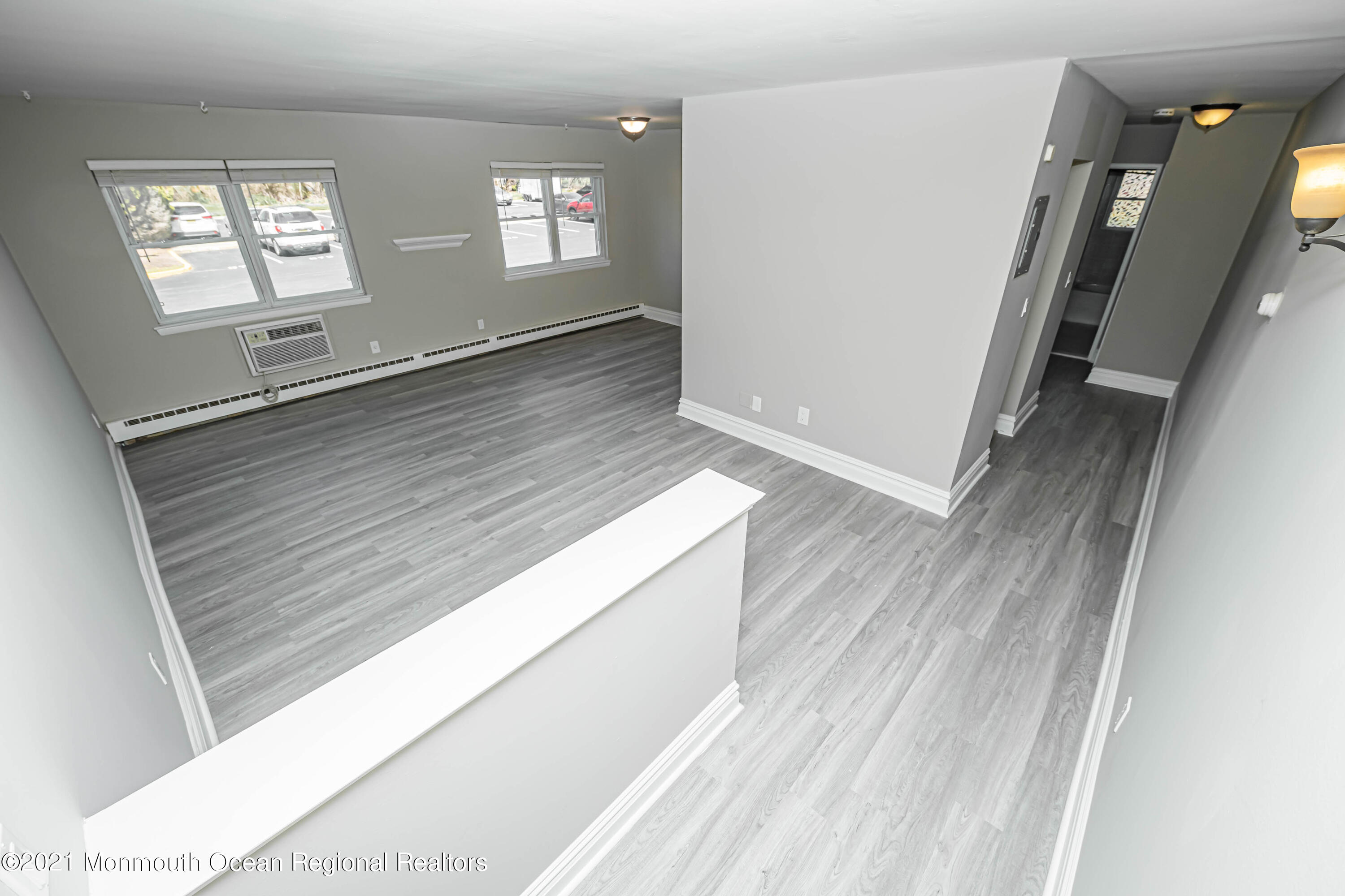 59 Stonehurst Boulevard, Unit B Freehold, NJ 07728 - Photo 10 of 25 a view of an empty room and window