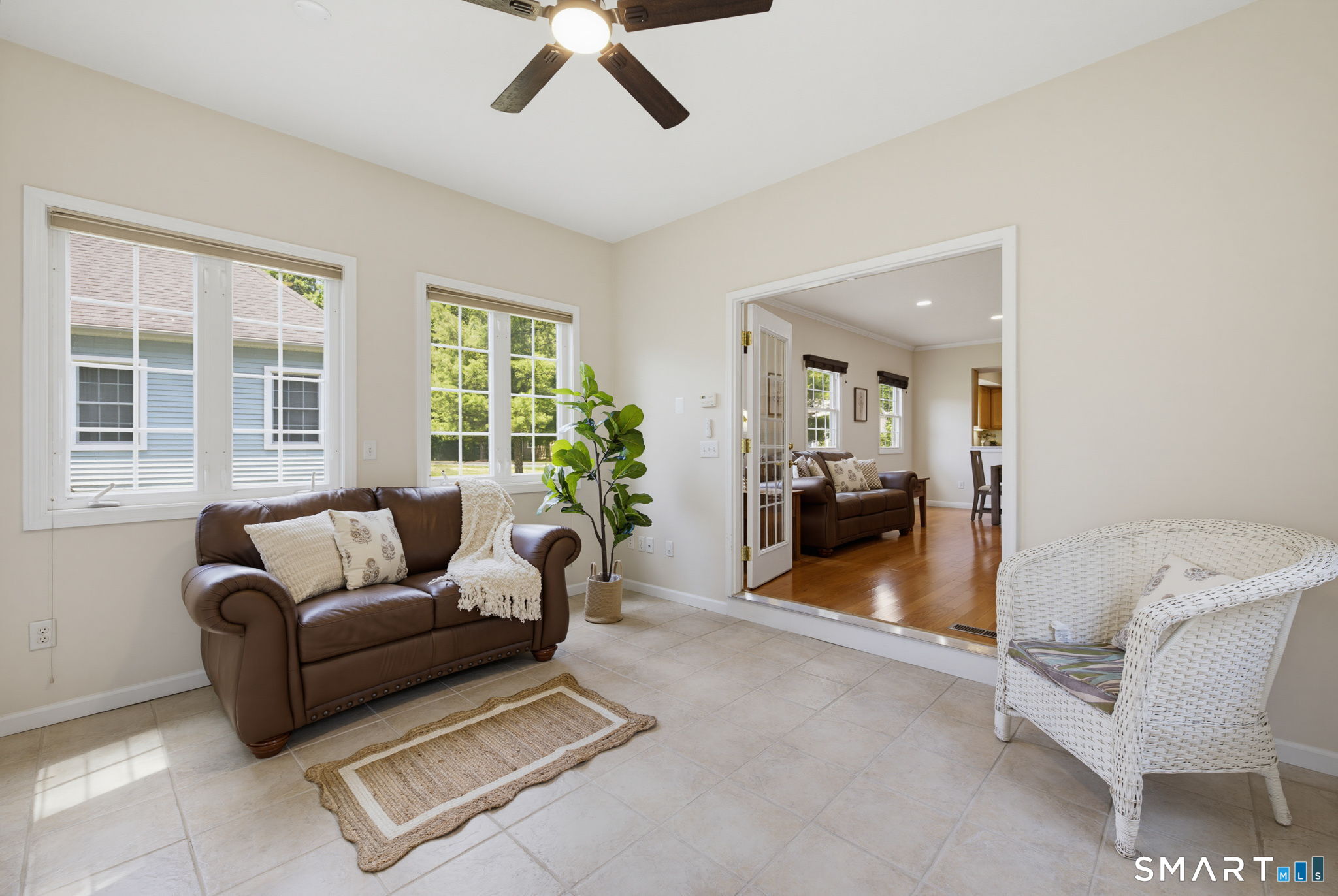 175 Oliver Way, Unit 175 Bloomfield, CT 06002 - Photo 9 of 20 French doors lead to the sunroom