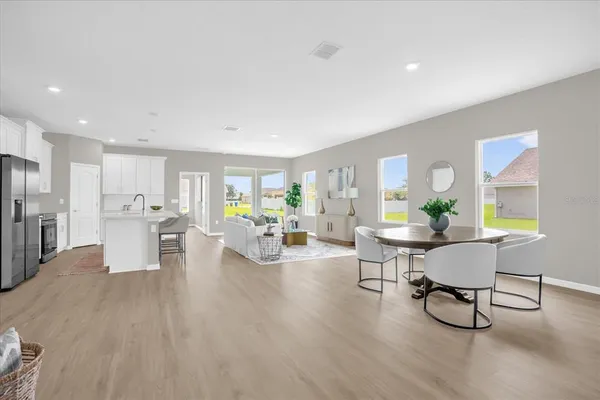 a living room with furniture and a table