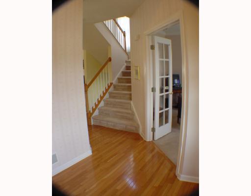 124 Field Club Drive West McKees Rocks, PA 15136 - Photo 9 of 18 Den/Family/Great Room. A view from the entry looking toward the den and steps to the second floor. 2 Story Foyer.