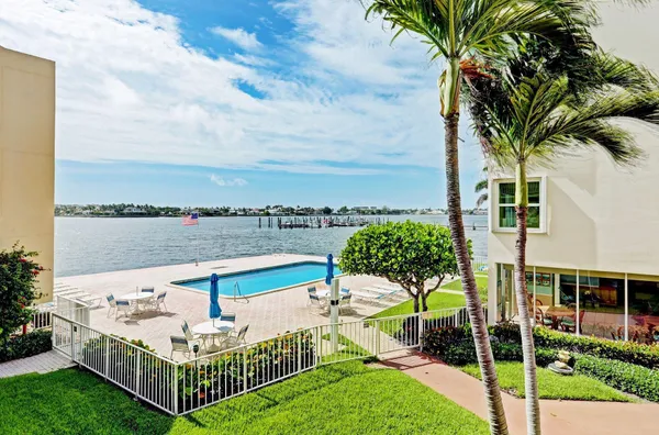 a view of swimming pool with lounge chair
