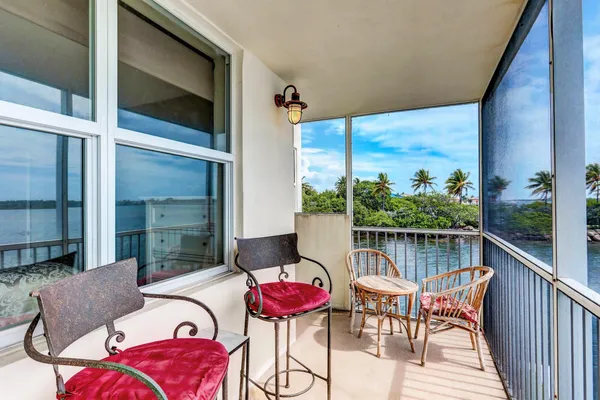a balcony with view of lake