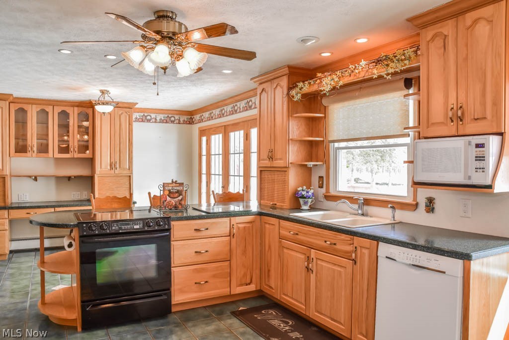 6094 Hanna Road Ravenna, OH 44266 - Photo 4 of 31 Stunning hickory cabinets in the kitchen!
