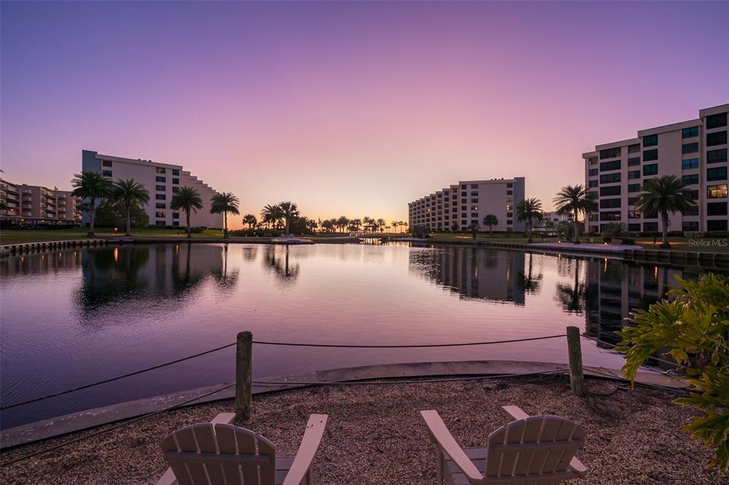 5780 Midnight Pass Road, Unit 210 Sarasota, FL 34242 - Photo 29 of 58 a view of a lake