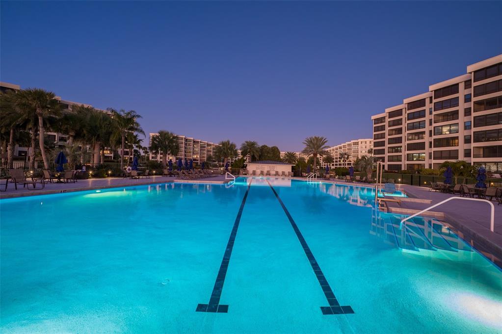 5780 Midnight Pass Road, Unit 210 Sarasota, FL 34242 - Photo 31 of 58 a view of a yard with swimming pool