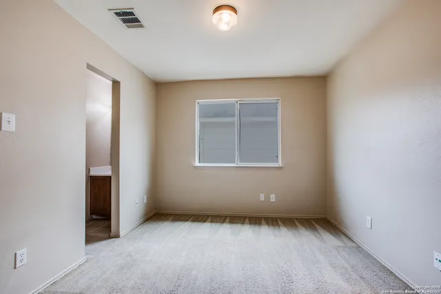 an empty room with a window