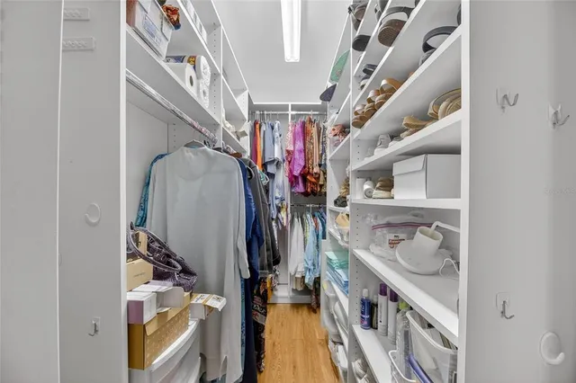 a view of a livingroom with furniture and wooden floor