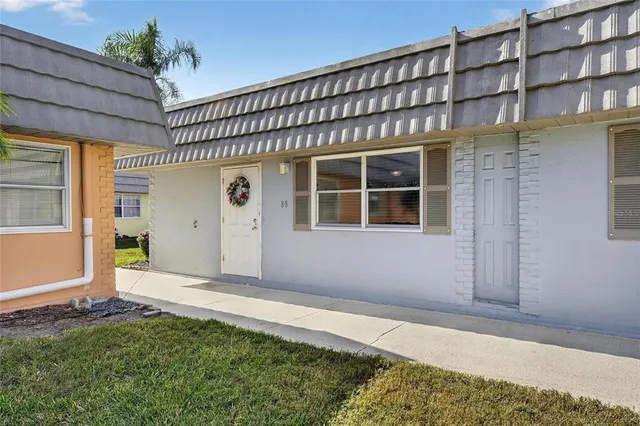 a view of a dining area with furniture window and wooden floor