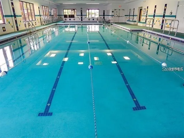 a view of a room with lots of chairs and toys