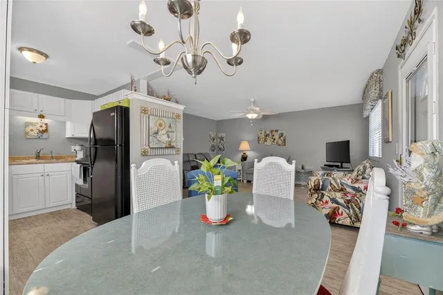 a kitchen with sink cabinets and window
