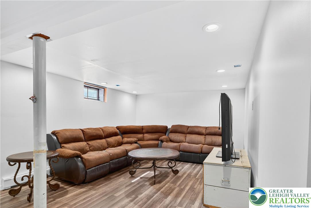 4164 Hecktown Road Bethlehem, PA 18020 - Photo 19 of 39 a living room with furniture and wooden floor