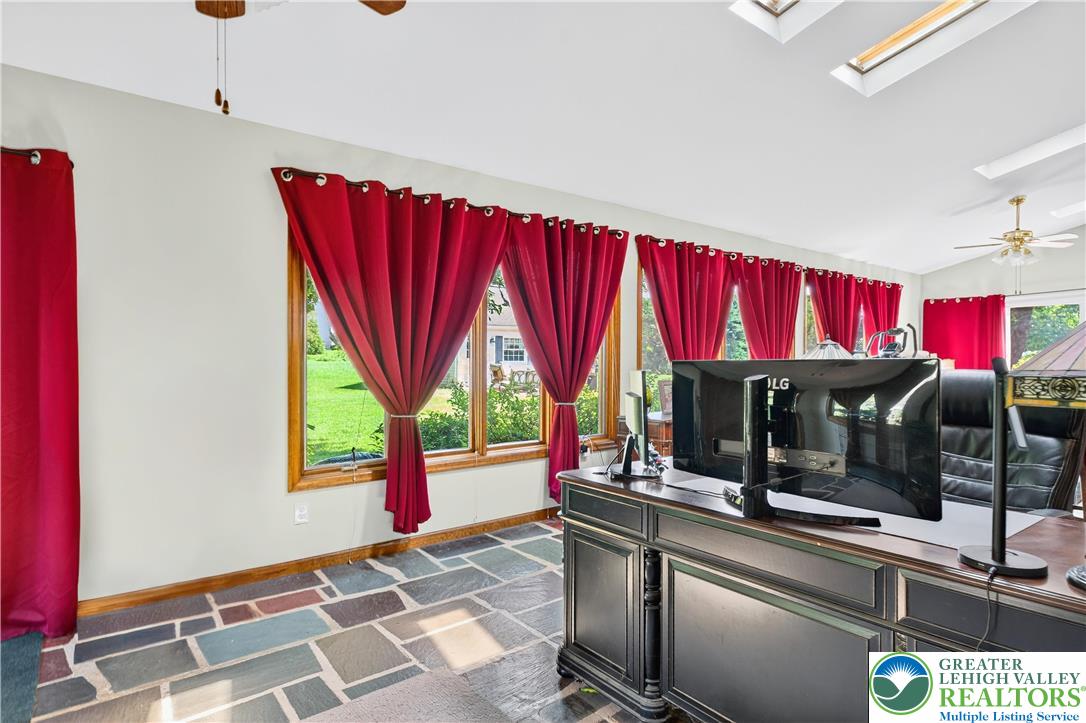 4164 Hecktown Road Bethlehem, PA 18020 - Photo 25 of 39 a view of a living room with a flat screen tv