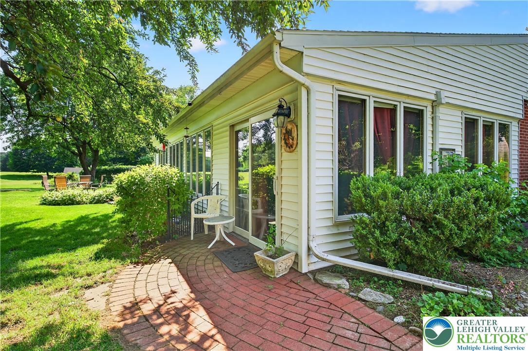 4164 Hecktown Road Bethlehem, PA 18020 - Photo 30 of 39 a view of house with backyard outdoor seating and green space