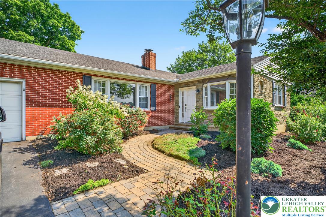 4164 Hecktown Road Bethlehem, PA 18020 - Photo 32 of 39 a front view of a house with garden