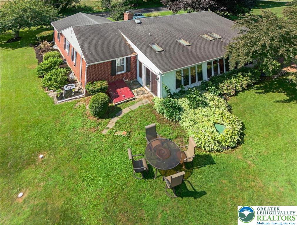 4164 Hecktown Road Bethlehem, PA 18020 - Photo 34 of 39 a aerial view of a house with swimming pool and garden