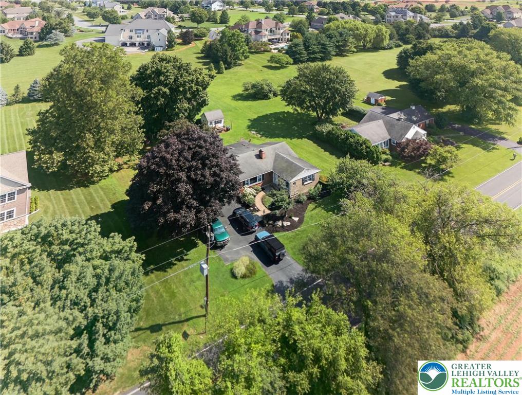 4164 Hecktown Road Bethlehem, PA 18020 - Photo 38 of 39 an aerial view of a house with a yard and lake view