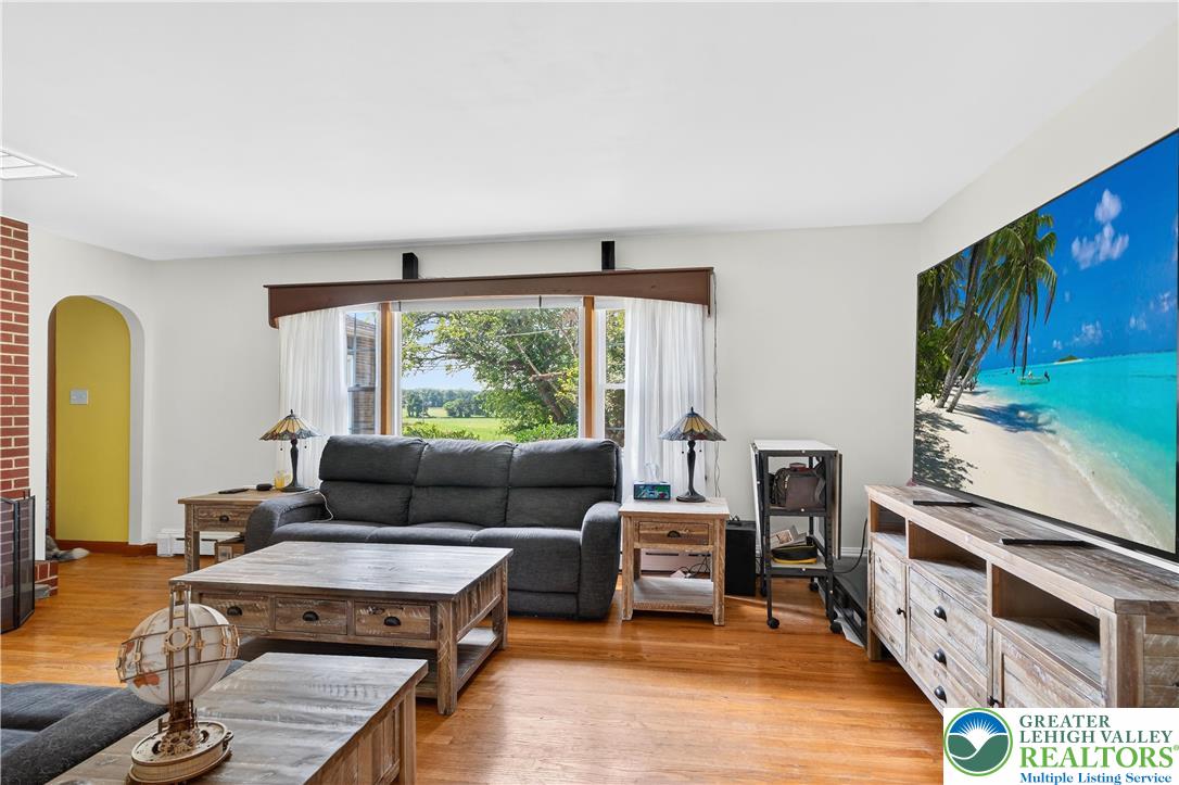 4164 Hecktown Road Bethlehem, PA 18020 - Photo 4 of 39 a living room with furniture and a window