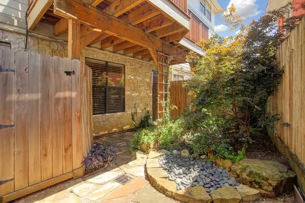 a view of a pathway with a yard