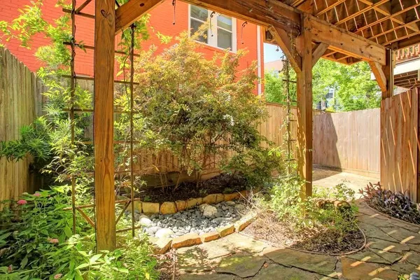 a view of a back yard of the house