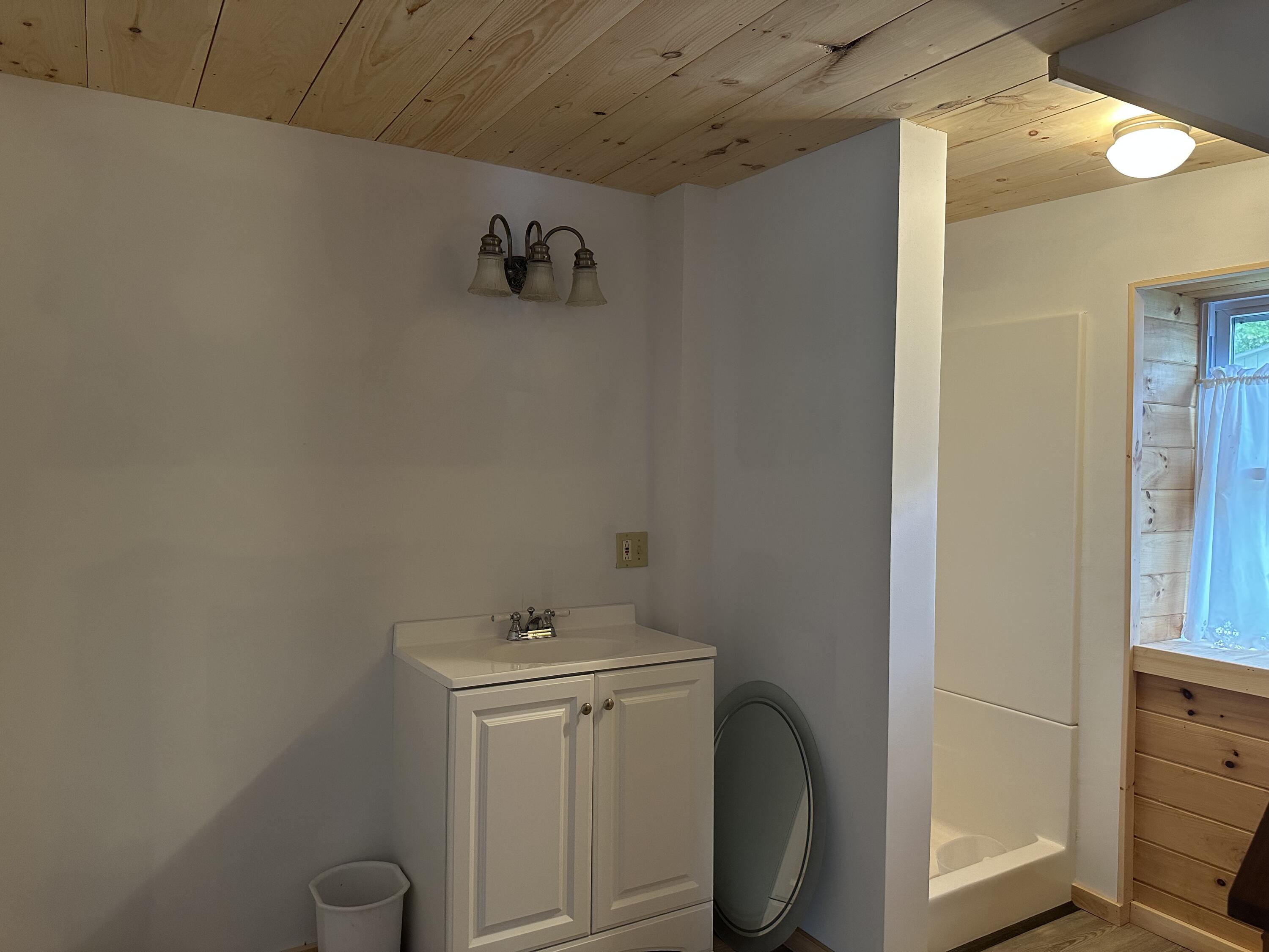 71 Irish Farm Road Peru, ME 04290 - Photo 17 of 21 camp bathroom 1