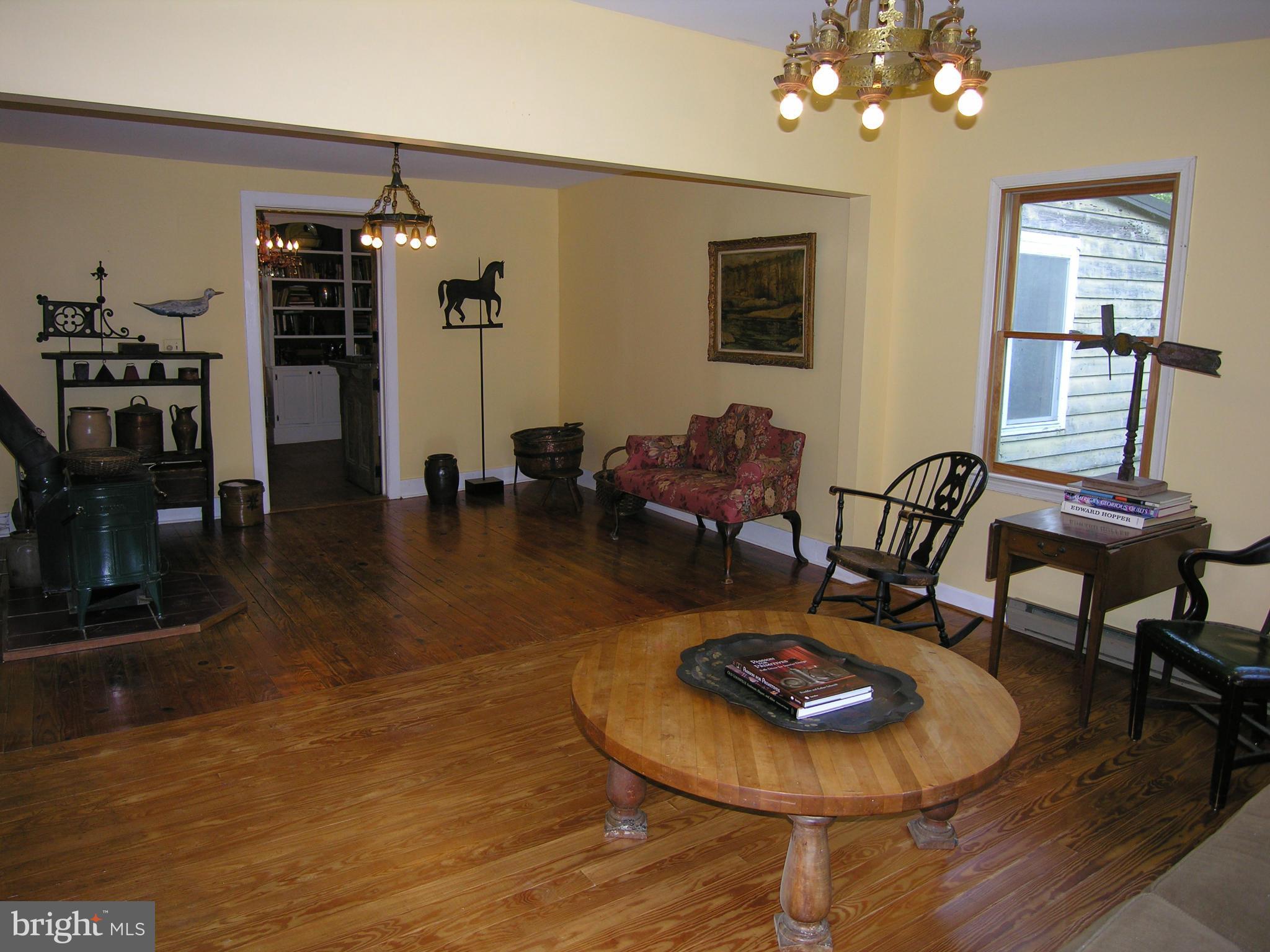 488 Quaintance Road Woodville, VA 22749 - Photo 3 of 20 Spacious great room with wood stove