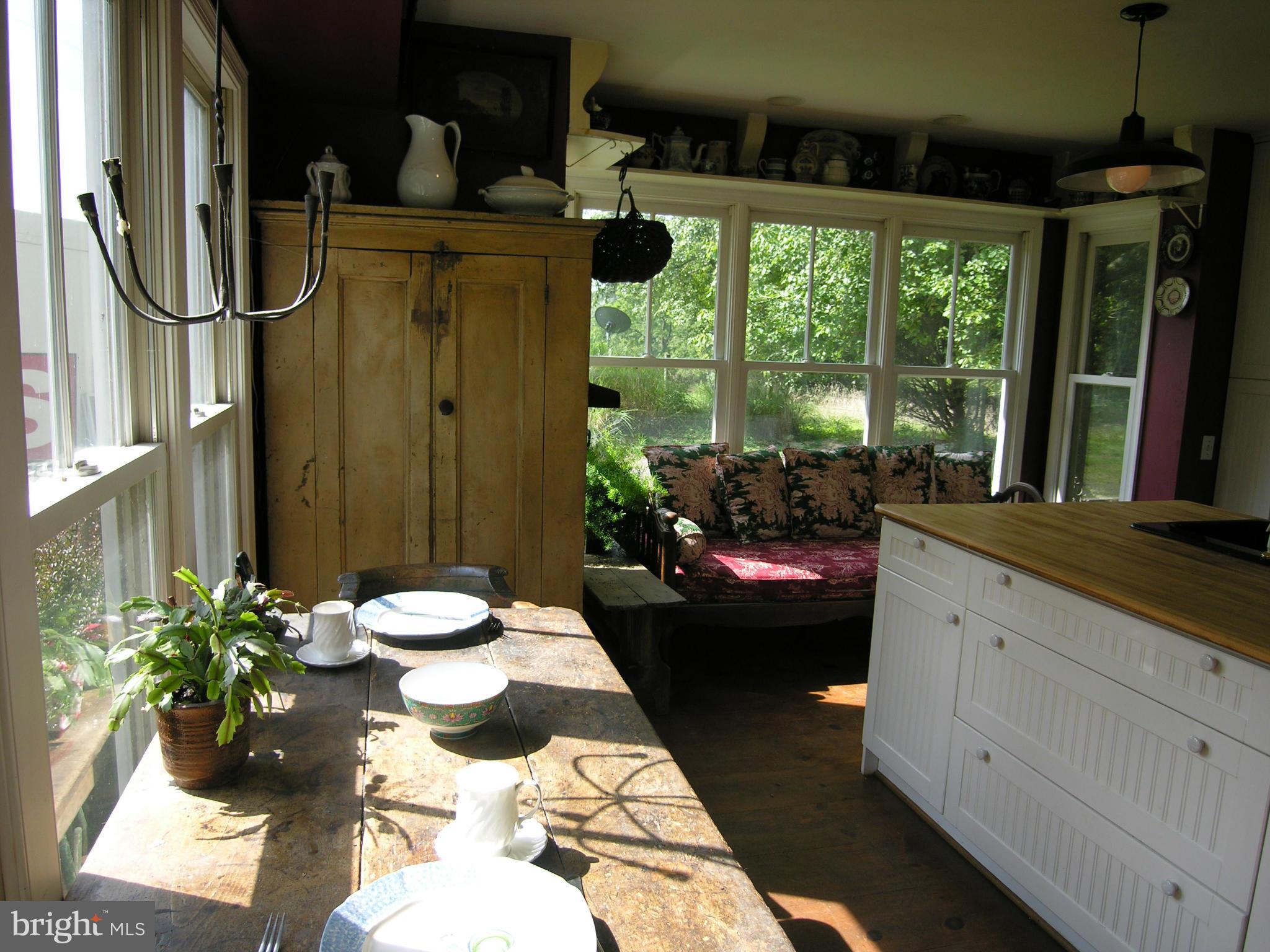 488 Quaintance Road Woodville, VA 22749 - Photo 7 of 20 Room for large table and lounging sofa