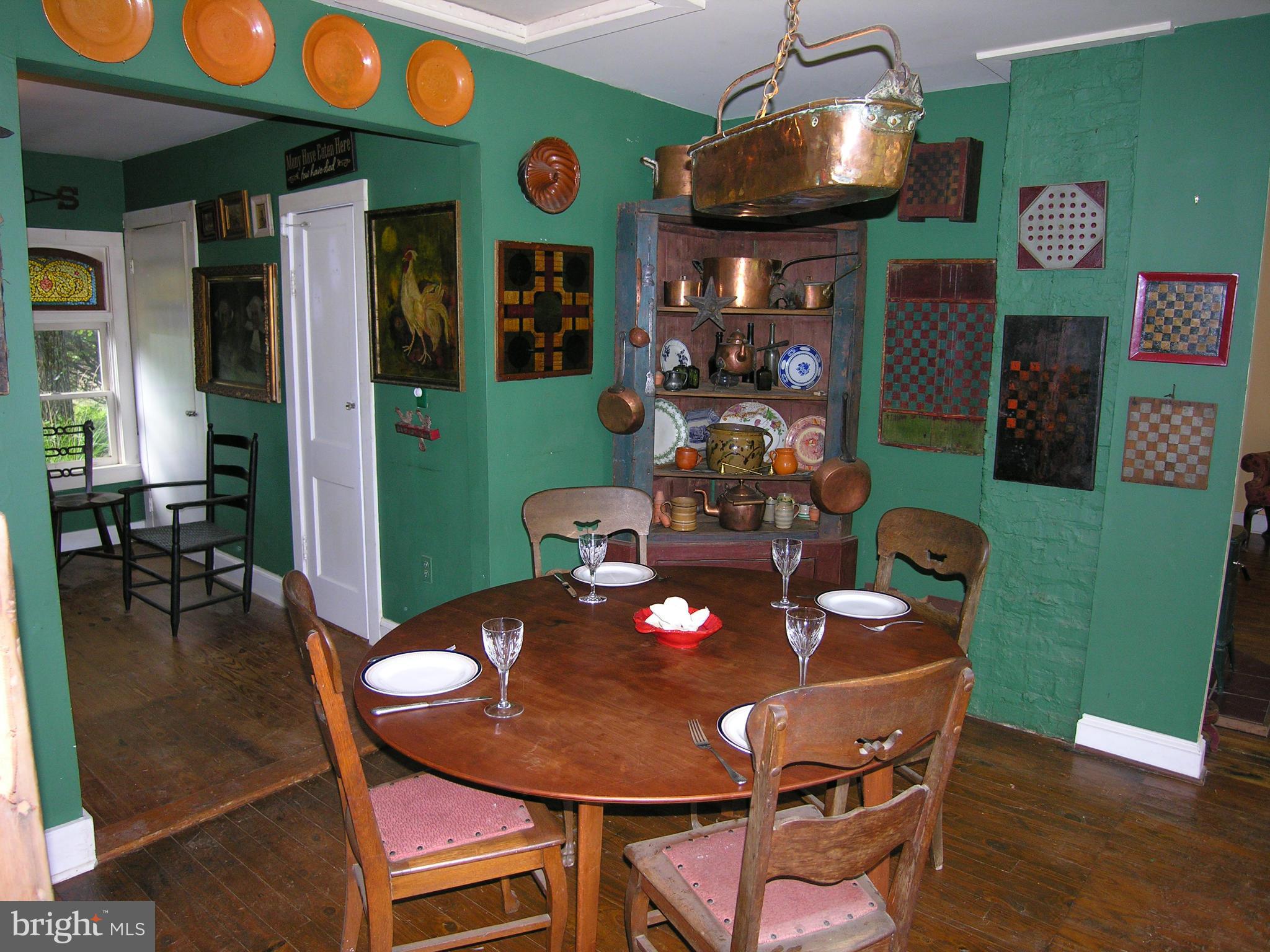 488 Quaintance Road Woodville, VA 22749 - Photo 9 of 20 Open dining room with wall of windows