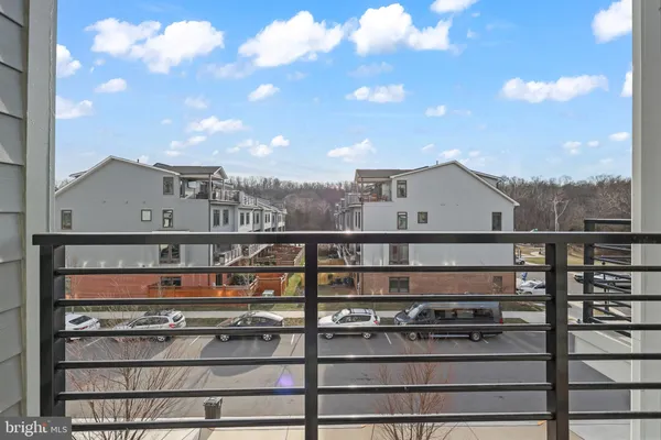 a view of a balcony with city view