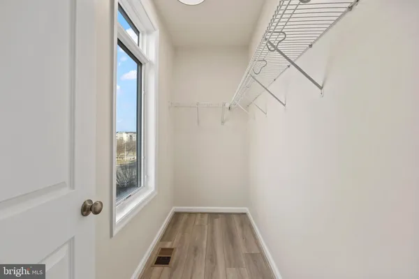 a view of a room with racks on the wall