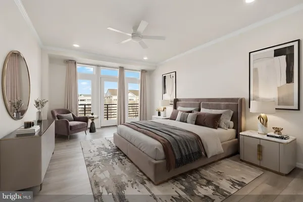 a bedroom with a large bed and a large window