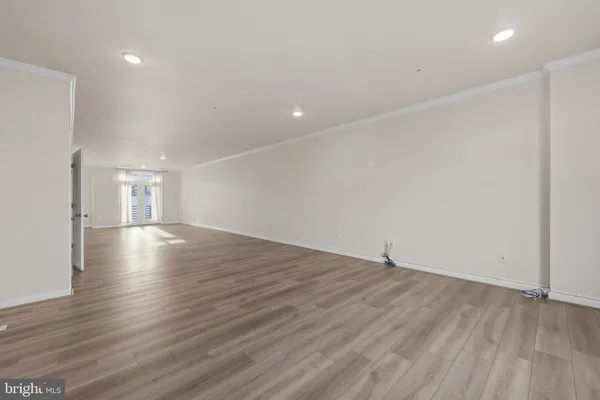 a view of room and wooden floor