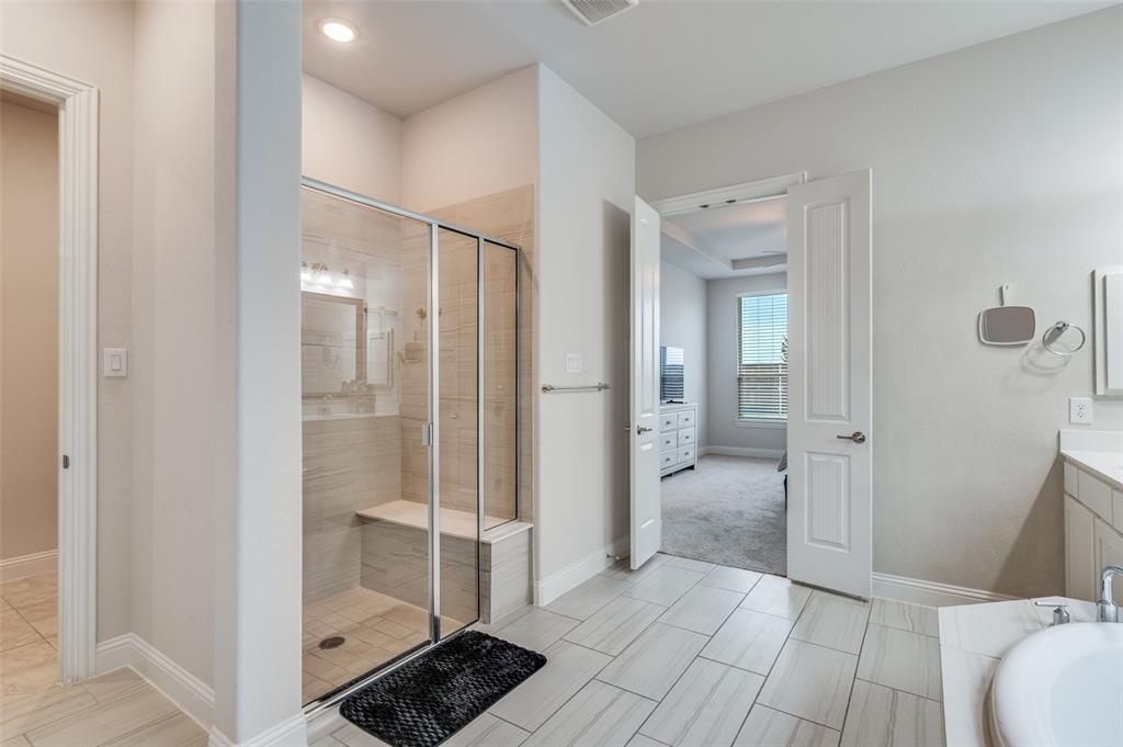 905 Flora Street Mansfield, TX 76063 - Photo 11 of 23 a bathroom with a shower and a sink