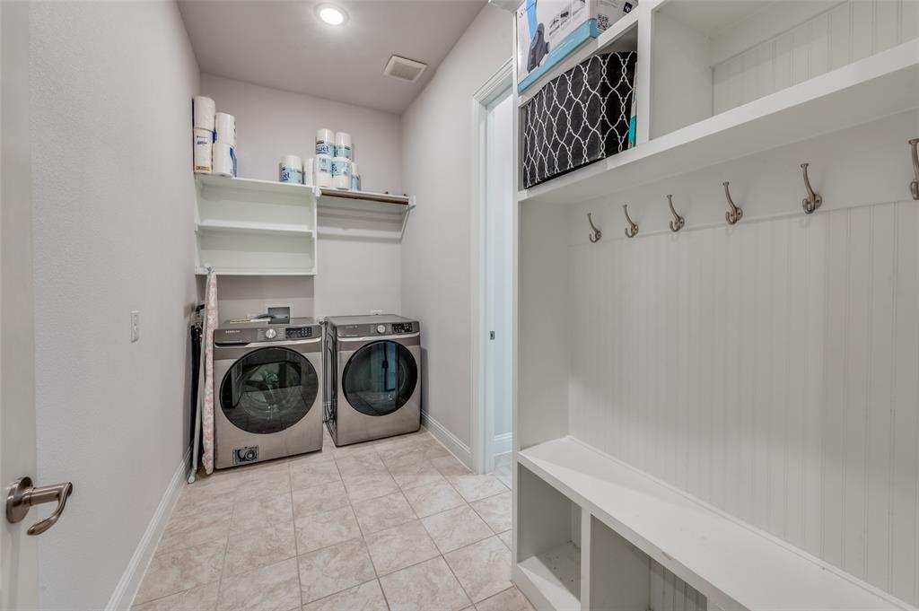 905 Flora Street Mansfield, TX 76063 - Photo 12 of 23 a utility room with sink dryer and washer