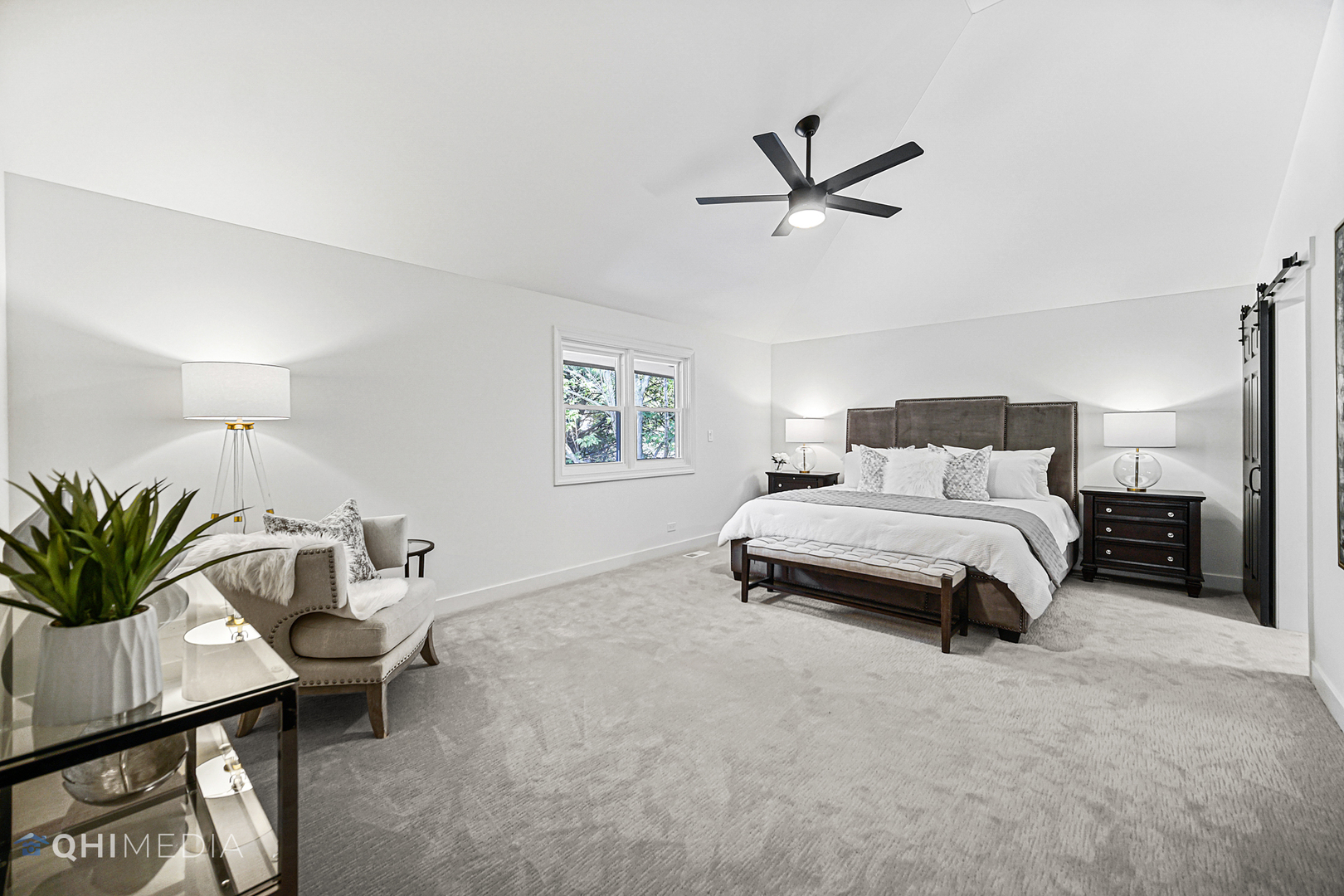 1801 Orchard Road Wheaton, IL 60189 - Photo 27 of 41 a bedroom with a bed and a chandelier