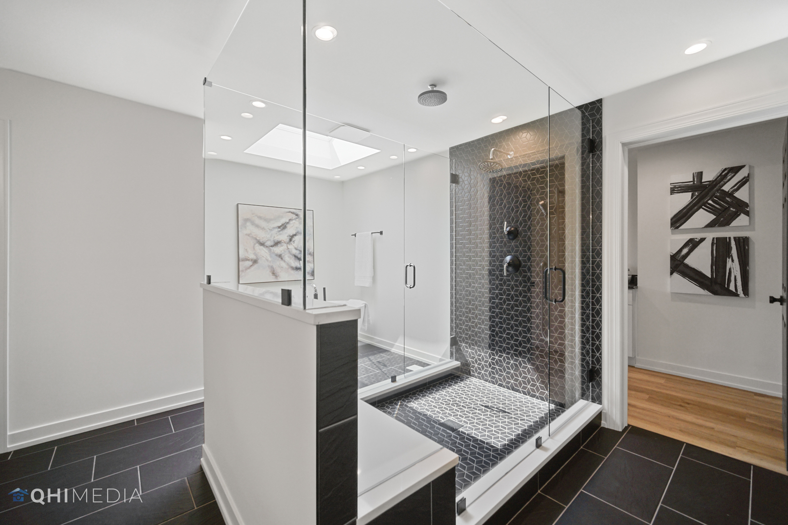 1801 Orchard Road Wheaton, IL 60189 - Photo 31 of 41 a bathroom with a glass shower door and a sink