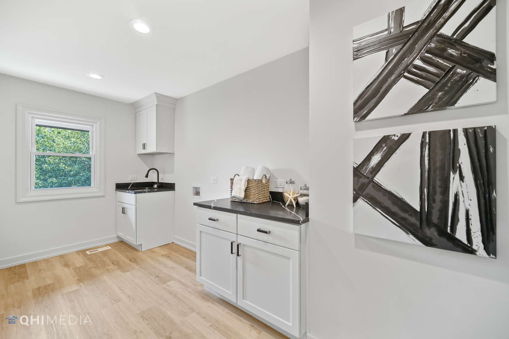 1801 Orchard Road Wheaton, IL 60189 - Photo 32 of 41 a kitchen with white cabinets and appliances