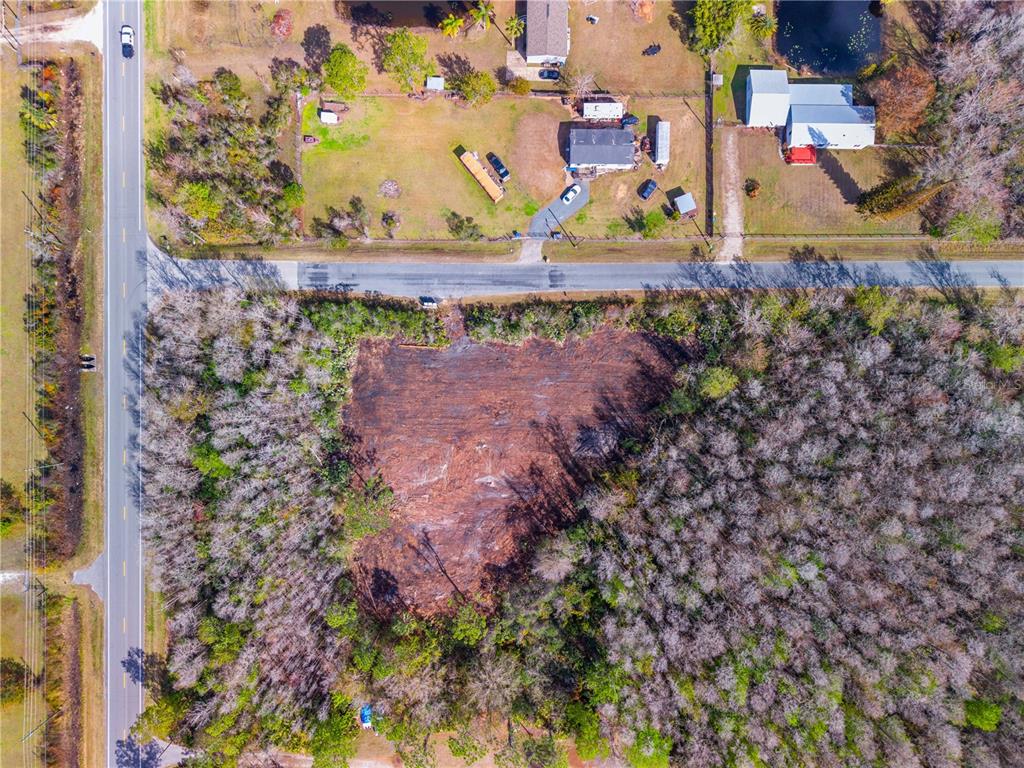 Holopaw Rd Street St. Cloud, FL 34773 - Photo 18 of 18 a view of a bench in a garden
