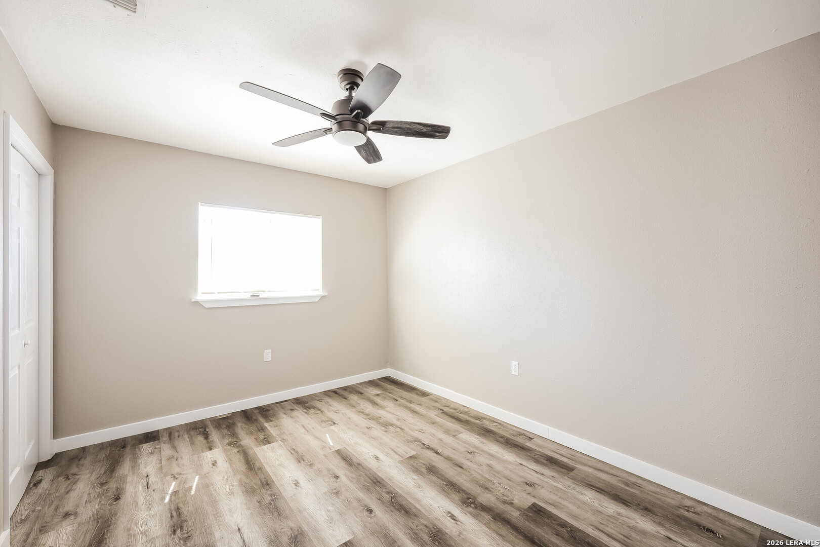 7030 Settlers Ridge Leon Valley, TX 78238 - Photo 12 of 19 a view of a room with a window and a ceiling fan