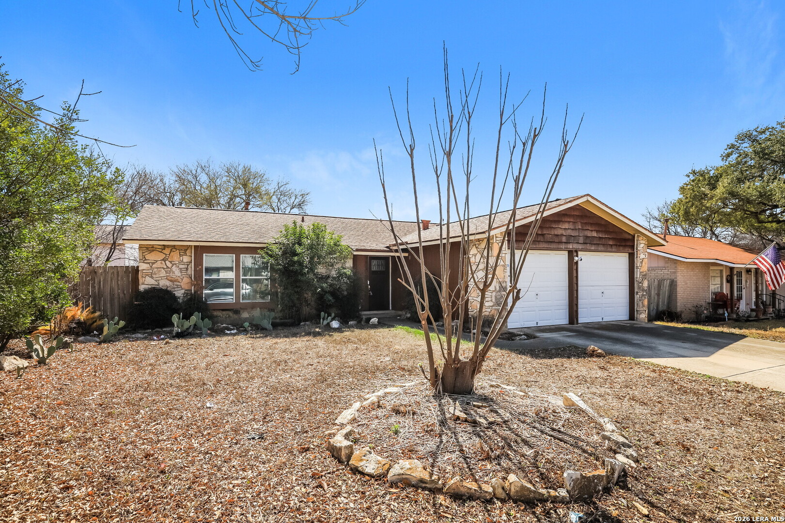 7030 Settlers Ridge Leon Valley, TX 78238 - Photo 2 of 19 a view of a house with a yard
