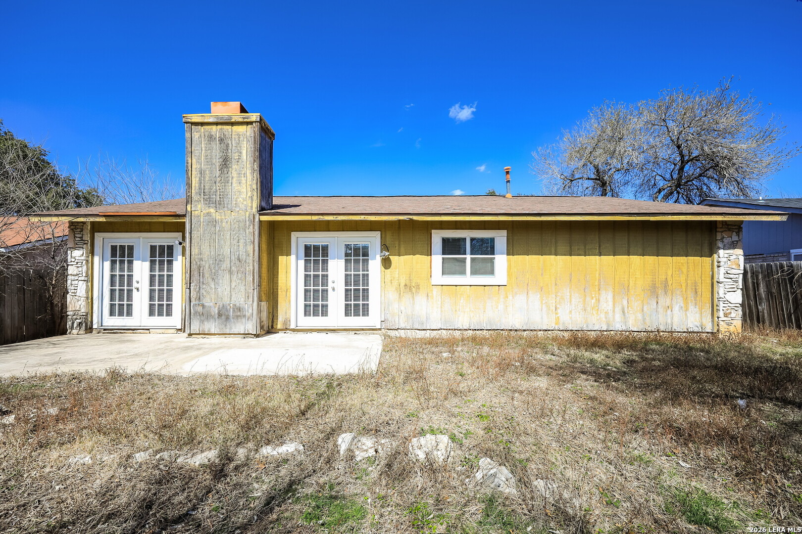 7030 Settlers Ridge Leon Valley, TX 78238 - Photo 3 of 19 a front view of a house with a garden