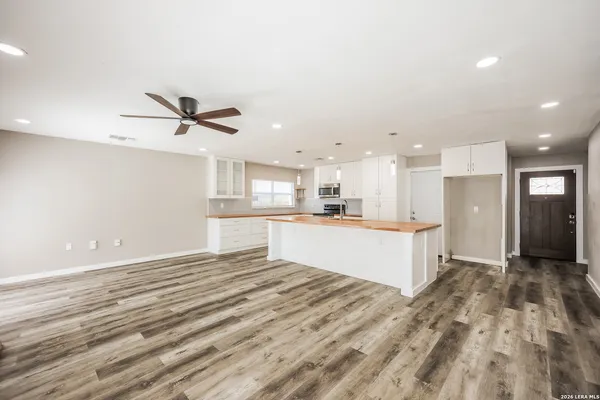a view of kitchen with wooden floor and window