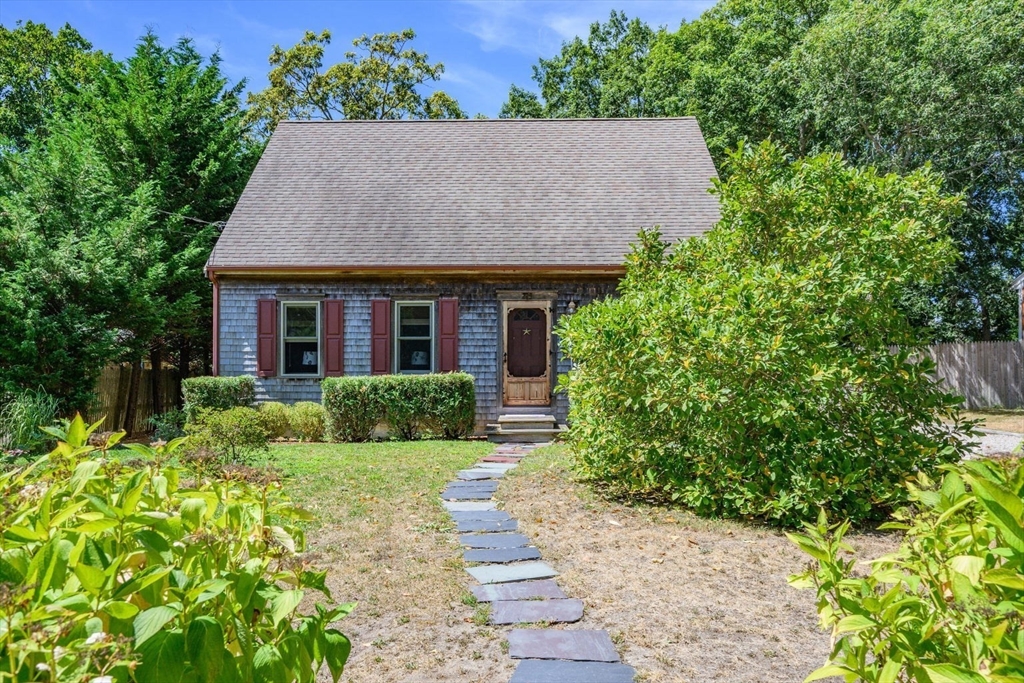 213 Hinckley Road Barnstable, MA 02601 - Photo 2 of 39 a aerial view of a house with a yard and potted plants