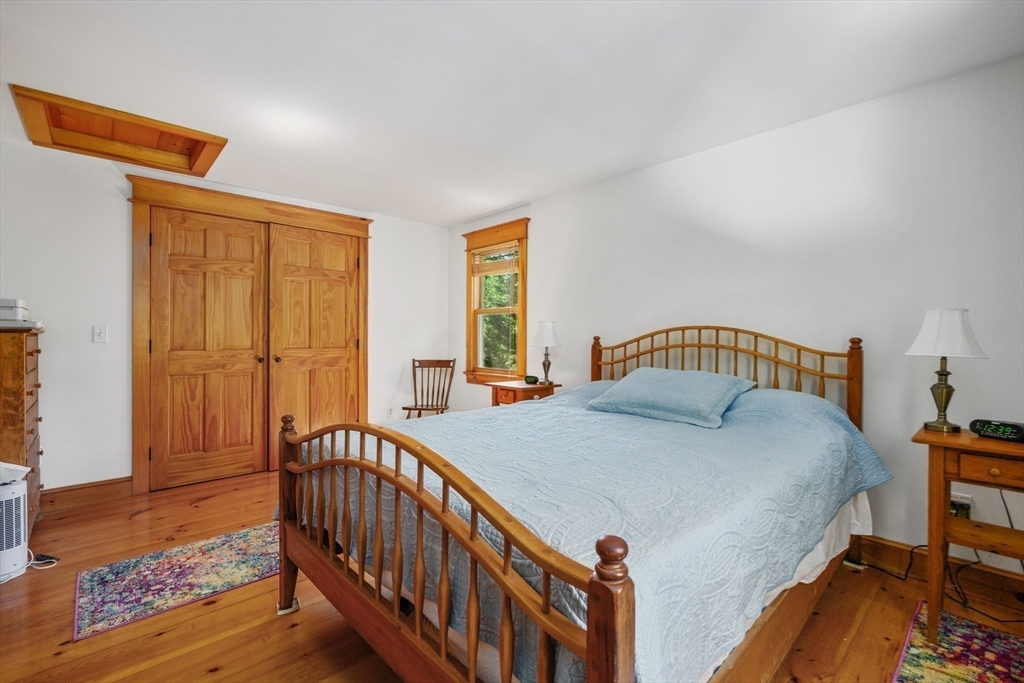 213 Hinckley Road Barnstable, MA 02601 - Photo 22 of 39 a bedroom with a bed and a window